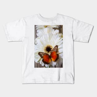 Brown Butterfly Resting On White Daisy Kids T-Shirt